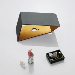 Arcchio Assona væglampe, sort-guld