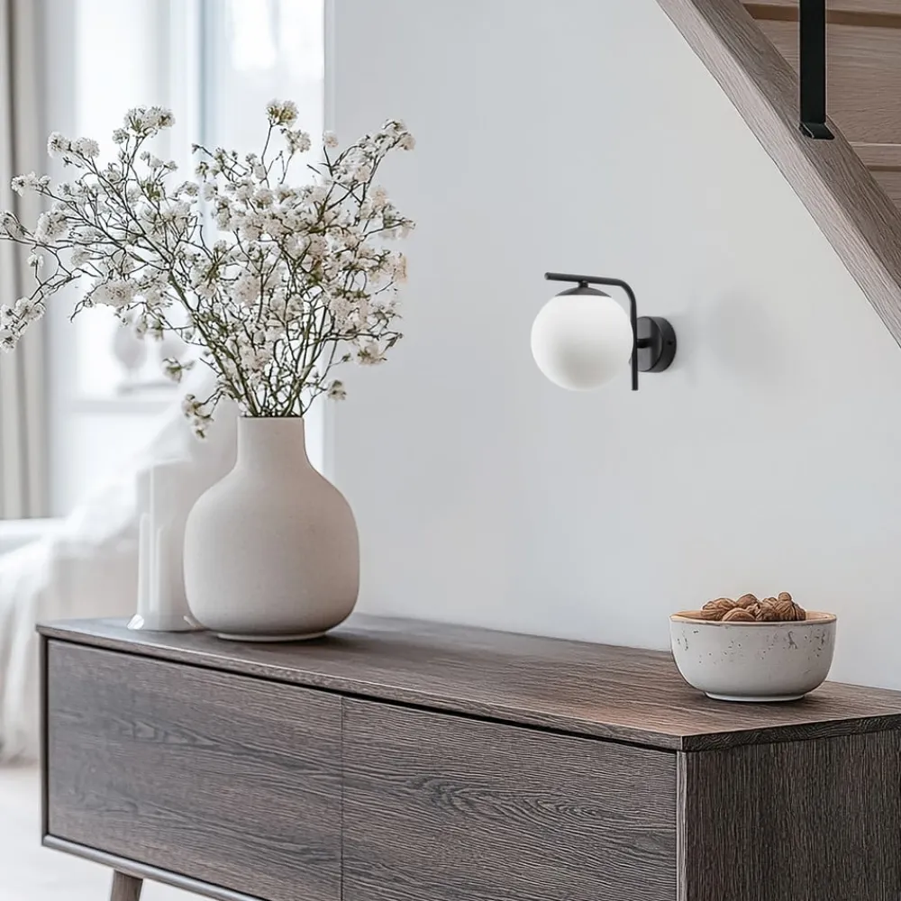 Domiluce Aurora væglampe, sort, glas, 17 cm høj, kugle, E14