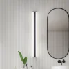 Helestra LED-spejllampe LOOM, længde 120 cm, sort, IP44