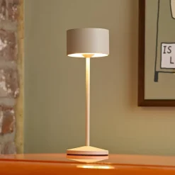 Sigor LED-bordlampe Veluna, beige, højde 25 cm, IP44, dæmpbar CCT