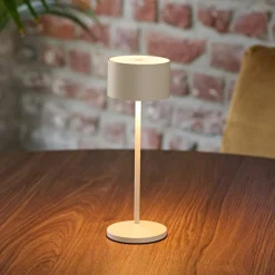 Sigor LED-bordlampe Veluna, beige, højde 25 cm, IP44, dæmpbar CCT