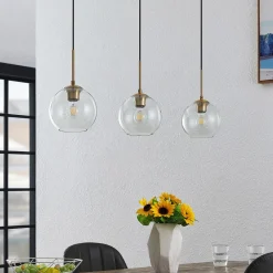 Grady hængelampe, messing/klar, 110 cm, metal, glas^Lindby Outlet