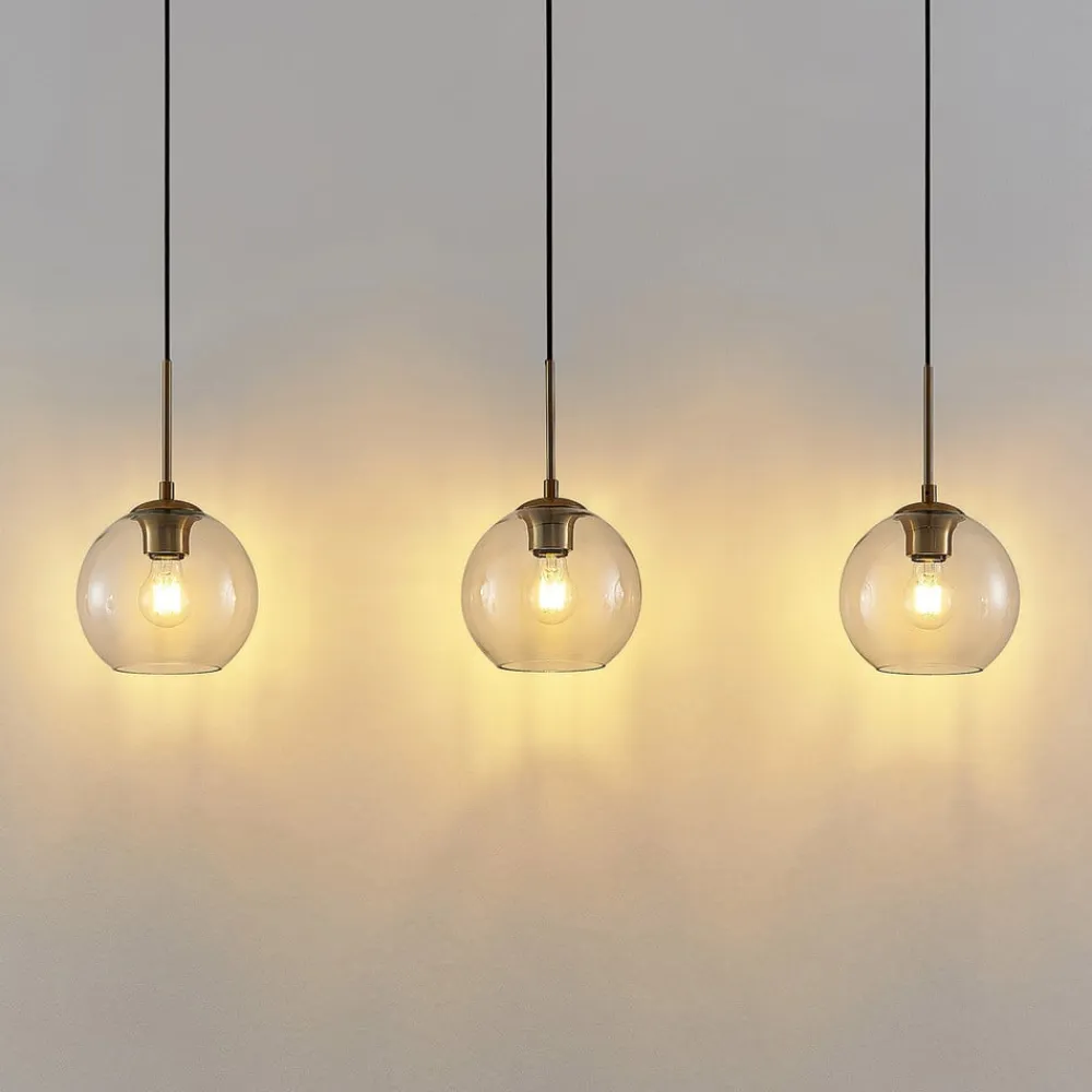 Grady hængelampe, messing/klar, 110 cm, metal, glas^Lindby Outlet