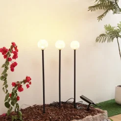 Lindby Solcellelamper|Udendørs Spot>LED-solcellelampe Brindley, sæt med 3, sort, glas