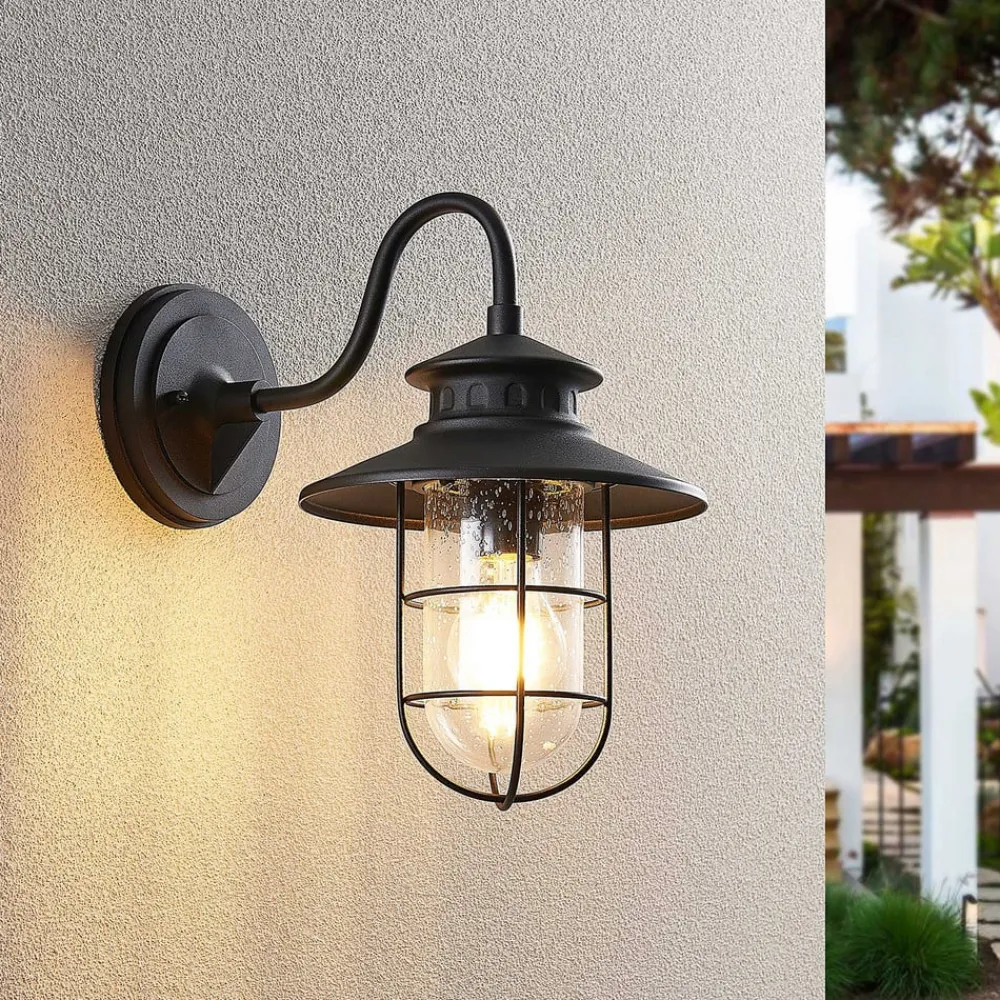 Lindby udendørs væglampe Kyan, højde 32 cm, sort, IP44, E27