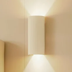 væglampe Colja, rund, højde 30,5 cm, gips, beige^Lindby Hot