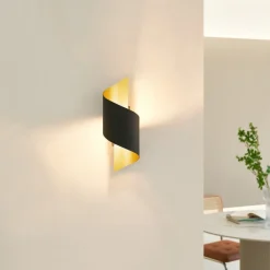 væglampe Desirio, sort/guld, 24 cm, metal^Lindby New