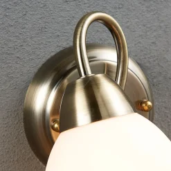 væglampe Mael, højde 20 cm, antik messing, trækkontakt^Lindby Clearance