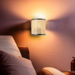 væglampe Yaelle, 20 cm høj, rattan, sort, E27^Lindby Best