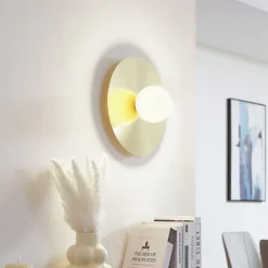 væglampe Zain, guld/hvid, glas, Ø 33 cm, G9^Lindby Online