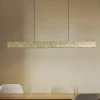 LED-hængelampe Nivara, 117 cm, guld, metal^Lucande Sale
