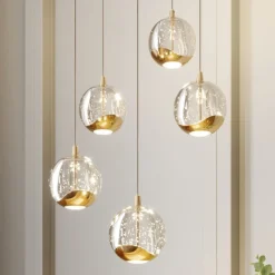 Lucande Pendellamper|Pendellamper>LED-pendellampe Hayley, Ø 30 cm, 5 lyskilder, guld, glas