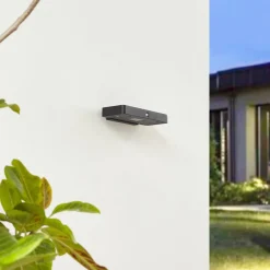 Lucande LED-solcelle-væglampe Tavon, kantet, sort, sensor