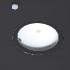 Lucande LED-solcelle-væglampe Tavon, rund, sort, sensor