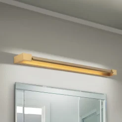 ORION Marylin væglampe til badeværelset, længde 90 cm, guld, aluminium