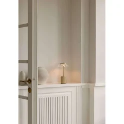 Nuura LED-batteridrevet bordlampe Blossi, højde 26 cm, guldfarvet/klar^Nuura Aps Discount