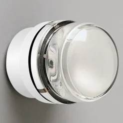 Oluce Fresnel - Væglampe med glaslinse IP44, hvid