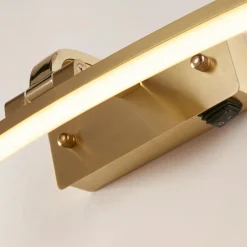 Searchlight Santorini LED-væglampe, bredde 50 cm, messing, vipbar